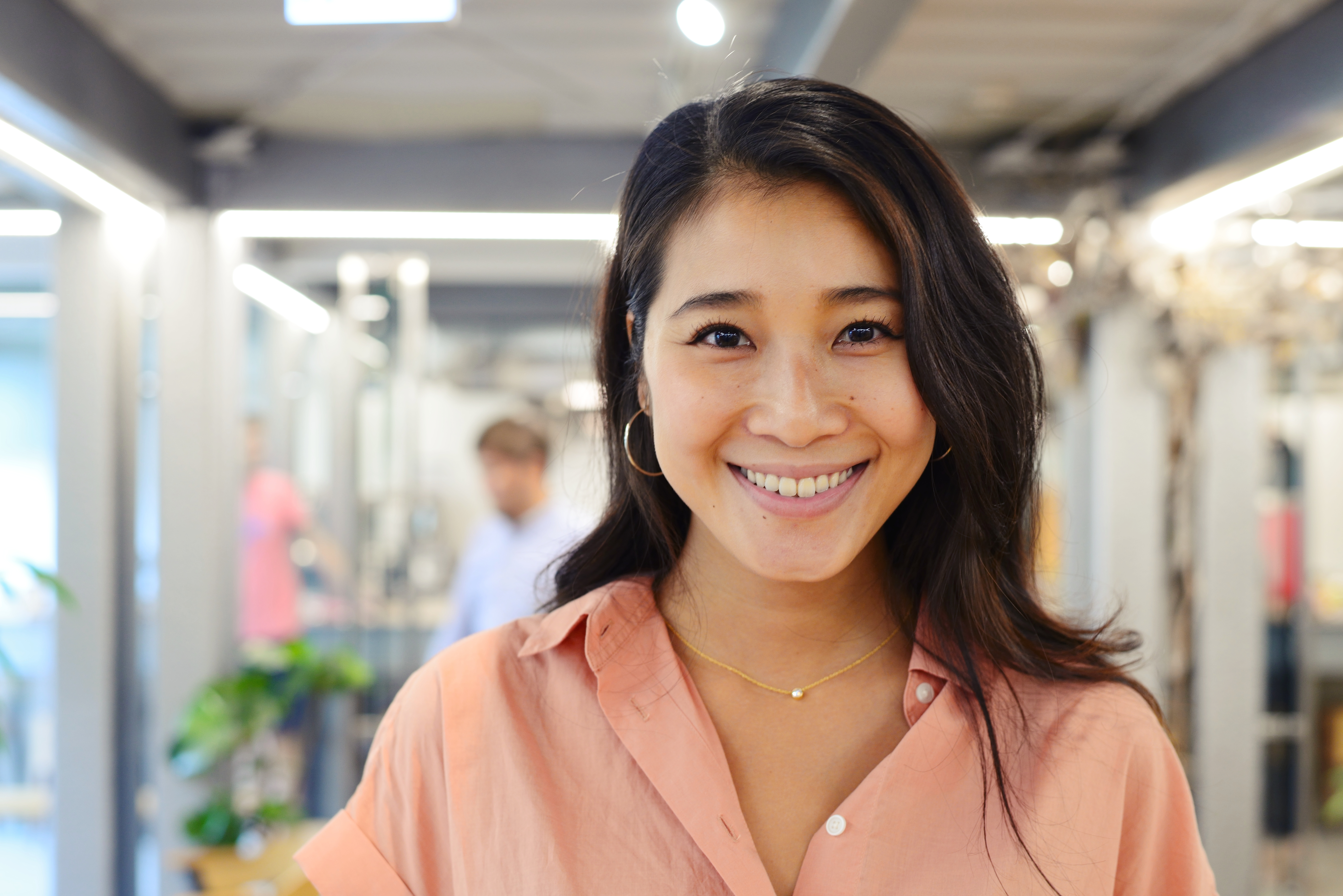 Asian woman looking at camera